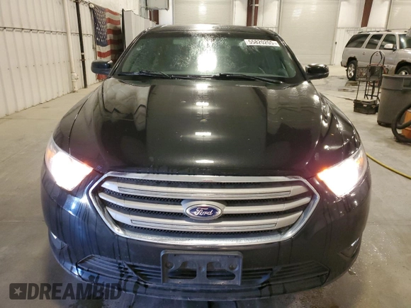 2014 Ford Taurus SEL z VIN 1FAHP2E82EG186640, wystawiony jako Copart lot #55820205 z przebiegiem 194 843 mil mil oraz Czysty tytuł • Clean title. Historia ofert i sprzedaży dostępna na DreamBid. Obrazek 5.