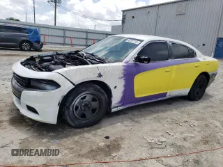 2013 Dodge Charger Police z VIN 2C3CDXAT7DH693268, wystawiony jako Copart lot #60107715 z przebiegiem 212 068 mil mil oraz Czysty tytuł • Clean title. Historia ofert i sprzedaży dostępna na DreamBid. Obrazek 1.