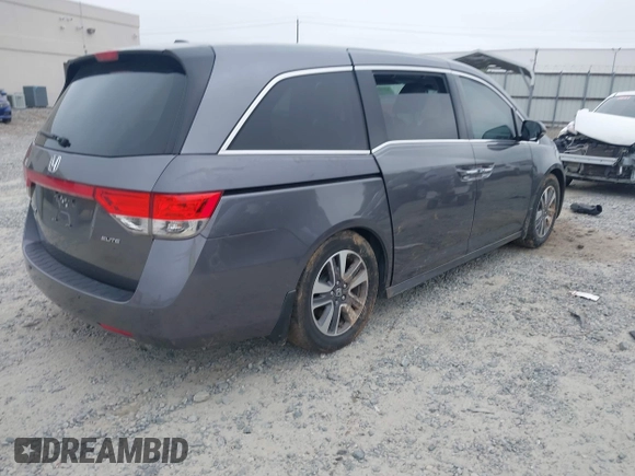 2014 Honda Odyssey Touring with VIN 5FNRL5H98EB008953, listed as a IAAI auction lot 42291179 with Not provided miles and . Bid and sale history available at DreamBid. Image 4.