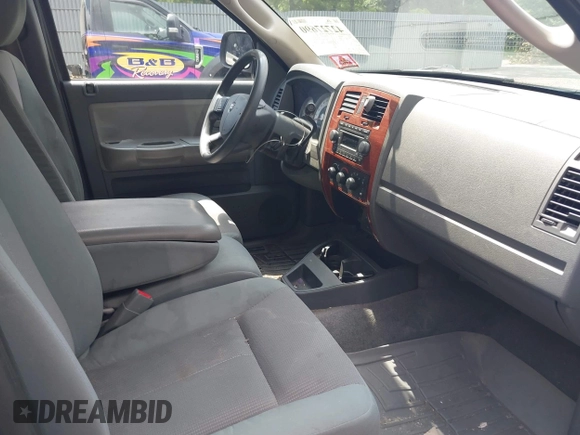 2005 Dodge Dakota SLT with VIN 1D7HW42N25S155393, listed as a IAAI auction lot 42727690 with 230,042 mi miles and . Bid and sale history available at DreamBid. Image 5.