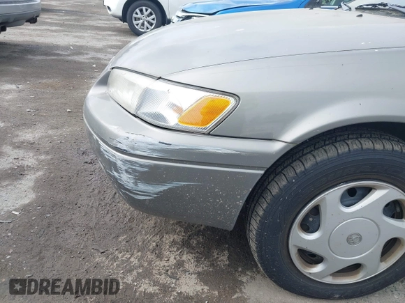 1998 Toyota Camry LE z VIN 4T1BF22K2WU042166, wystawiony jako IAAI lot #42416930 z przebiegiem 124 809 mil mil oraz . Historia ofert i sprzedaży dostępna na DreamBid. Obrazek 6.