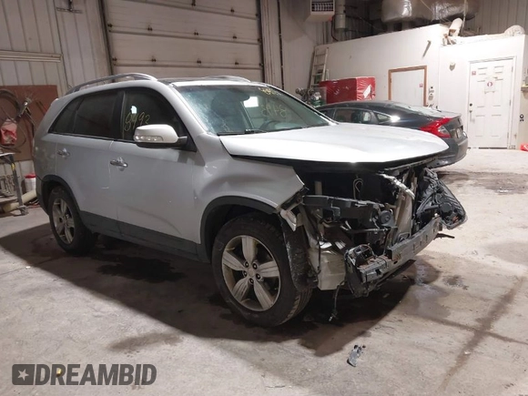 2012 Kia Sorento EX with VIN 5XYKU4A29CG285803, listed as a IAAI auction lot 41588493 with 171,891 mi miles. Bid and sale history available at carsss.com. Image 1.