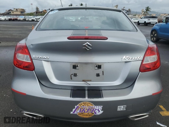 2011 Suzuki Kizashi SE z VIN JS2RE9A3XB6111196, wystawiony jako Copart lot #48076635 z przebiegiem 113 569 mil mil oraz Szkody całkowita. Historia ofert i sprzedaży dostępna na DreamBid. Obrazek 6.