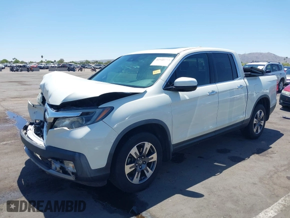 2019 Honda Ridgeline RTL-E with VIN 5FPYK3F74KB009279, listed as a IAAI auction lot 42348773 with 98,141 mi miles and . Bid and sale history available at DreamBid. Image 17.