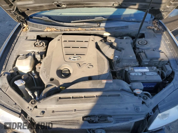 2009 Hyundai Azera Limited z VIN KMHFC46F79A341743, wystawiony jako Copart lot #83299354 z przebiegiem 98 779 mil mil oraz Szkoda całkowita • Salvage title. Historia ofert i sprzedaży dostępna na DreamBid. Obrazek 11.