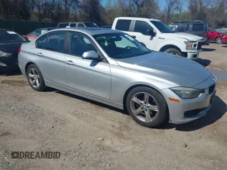 2013 BMW 3 Series 328i with VIN WBA3C1G52DNR44660, listed as a IAAI auction lot 41994277 with 165,151 mi miles. Bid and sale history available at carsss.com. Image 1.