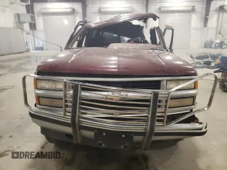1995 Chevrolet Tahoe z VIN 1GNEK13KXSJ427631, wystawiony jako Copart lot #52624475 z przebiegiem 228 492 mil mil oraz Nie do naprawy. Historia ofert i sprzedaży dostępna na DreamBid. Obrazek 5.
