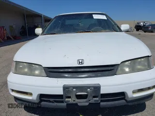 1995 Honda Accord EX z VIN 1HGCD5565SA042044, wystawiony jako IAAI lot #42433765 z przebiegiem 255 906 mil mil oraz . Historia ofert i sprzedaży dostępna na DreamBid. Obrazek 6.