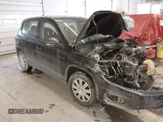 2018 Volkswagen Tiguan with VIN WVGBV7AX5JK002911, listed as a IAAI auction lot 41385815 with Not Provided miles and . Bid and sale history available at DreamBid. Image 1.