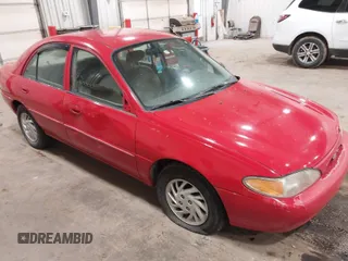 1999 Ford Escort SE z VIN 1FAFP13P9XW186025, wystawiony jako IAAI lot #41947061 z przebiegiem 89 571 mil mil oraz . Historia ofert i sprzedaży dostępna na DreamBid. Obrazek 1.
