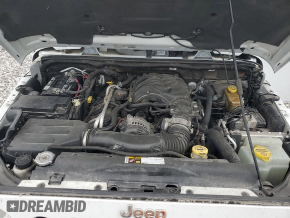 2014 Jeep Wrangler Unlimited Sahara with VIN 1C4BJWEG8EL266340, listed as a Copart auction lot 57809465 with 121,191 mi miles and Salvage title. Bid and sale history available at DreamBid. Image 12.