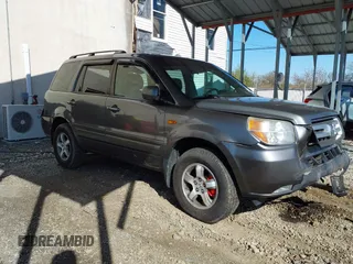 2007 Honda Pilot EX-L with VIN 5FNYF18777B012649, listed as a IAAI auction lot 42070873 with 167,419 mi miles and . Bid and sale history available at DreamBid. Image 1.