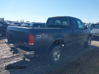 1999 Ford F-150 with VIN 1FTRX18W5XNA08724, listed as a IAAI auction lot 41484808 with Not provided miles and . Bid and sale history available at DreamBid. Image 4.