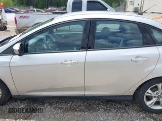 2014 Ford Focus SE with VIN 1FADP3F28EL162669, listed as a IAAI auction lot 42128555 with 104,265 mi miles and . Bid and sale history available at carsss.com. Image 14.