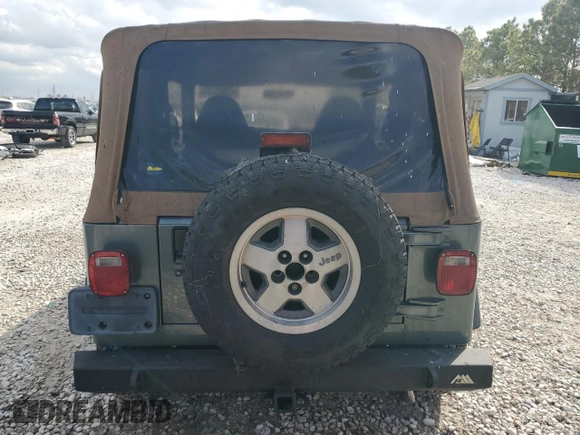 2000 Jeep Wrangler SE with VIN 1J4FA29P6YP753791, listed as a Copart auction lot 43945135 with 162,532 mi miles and Salvage Title. Bid and sale history available at carsss.com. Image 6.