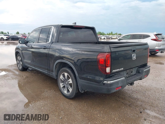 2017 Honda Ridgeline RTL-T with VIN 5FPYK2F64HB003542, listed as a IAAI auction lot 42171243 with 102,071 mi miles and . Bid and sale history available at DreamBid. Image 3.