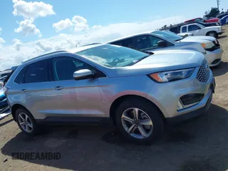 2024 Ford Edge SEL z VIN 2FMPK4J9XRBA43703, wystawiony jako IAAI lot #42064393 z przebiegiem 15 522 mil mil oraz . Historia ofert i sprzedaży dostępna na DreamBid. Obrazek 14.