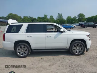 2017 Chevrolet Tahoe LT z VIN 1GNSKBKC2HR330422, wystawiony jako IAAI lot #42419205 z przebiegiem 136 444 mil mil oraz . Historia ofert i sprzedaży dostępna na DreamBid. Obrazek 13.