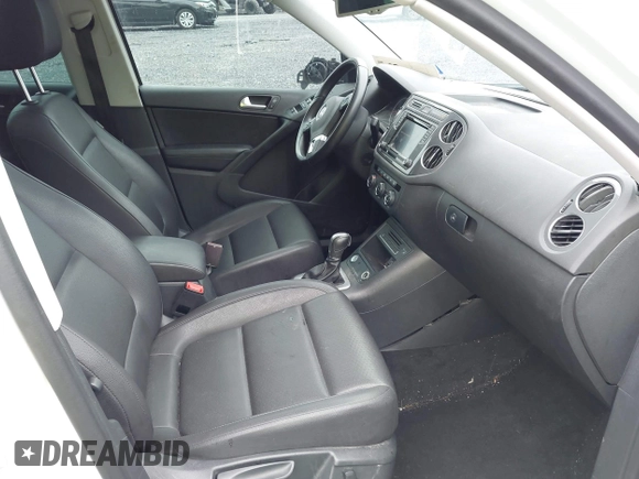 2017 Volkswagen Tiguan Wolfsburg Edition with VIN WVGRV7AX9HK002659, listed as a IAAI auction lot 42482438 with 88,841 mi miles and . Bid and sale history available at DreamBid. Image 5.