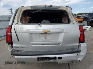 2016 Chevrolet Suburban LT z VIN 1GNSKHKC4GR285212, wystawiony jako Copart lot #58021115 z przebiegiem Nie podano mil oraz Szkoda całkowita • Salvage title. Historia ofert i sprzedaży dostępna na DreamBid. Obrazek 6.