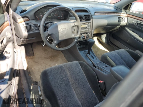 1999 Toyota Solara SE with VIN 2T1CF22P6XC135534, listed as a Copart auction lot 61900395 with 177,838 mi miles and Salvage title. Bid and sale history available at DreamBid. Image 8.