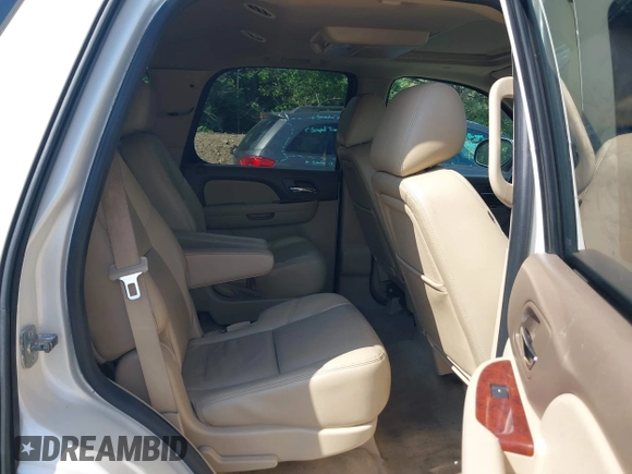2013 Chevrolet Tahoe LTZ with VIN 1GNSKCE07DR326996, listed as a IAAI auction lot 42203073 with 147,067 mi miles and . Bid and sale history available at DreamBid. Image 8.