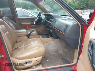 1996 Jeep Grand Cherokee Limited with VIN 1J4GZ78YXTC295872, listed as a IAAI auction lot 42339960 with 265,609 mi miles and . Bid and sale history available at DreamBid. Image 5.