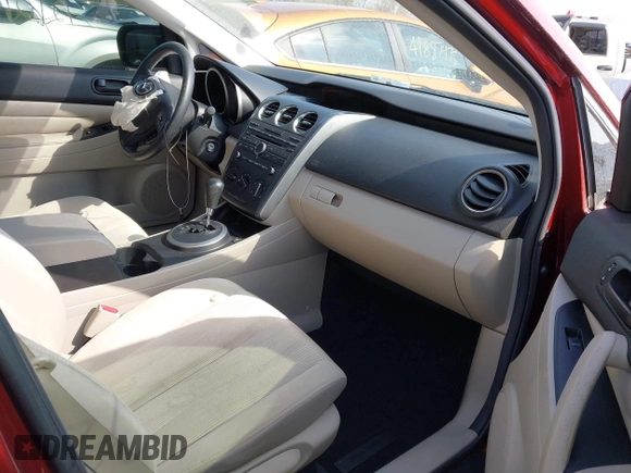 2010 Mazda CX-7 Sport with VIN JM3ER2W54A0319971, listed as a IAAI auction lot 41963026 with 121,213 mi miles and . Bid and sale history available at DreamBid. Image 5.