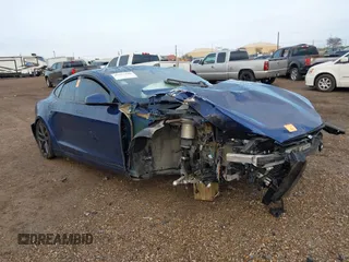 2021 Tesla Model S Long Range with VIN 5YJSA1E50MF432224, listed as a IAAI auction lot 41417130 with Not provided miles and . Bid and sale history available at DreamBid. Image 13.