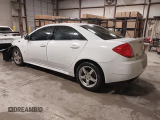 2009 Pontiac G6 1SB z VIN 1G2ZJ57K494243961, wystawiony jako IAAI lot #41560966 z przebiegiem 210 819 mil mil oraz . Historia ofert i sprzedaży dostępna na DreamBid. Obrazek 3.