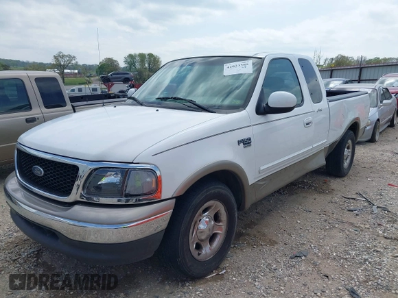 2003 Ford F-150 XL with VIN 1FTRX17L33NB79733, listed as a IAAI auction lot 42023385 with 136,236 mi miles. Bid and sale history available at carsss.com. Image 17.