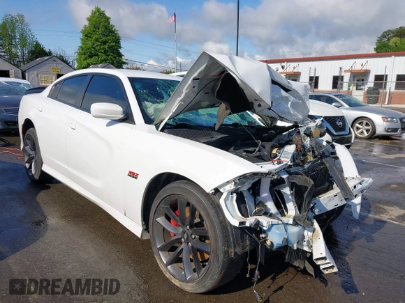 2019 Dodge Charger Scat Pack with VIN 2C3CDXGJ3KH558856, listed as a IAAI auction lot 42009847 with 62,546 mi miles and . Bid and sale history available at DreamBid. Image 1.
