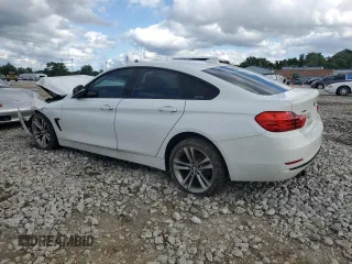 2015 BMW 4 Series 428i xDrive with VIN WBA4A7C53FD415066, listed as a Copart auction lot 61880545 with 130,874 mi miles and Salvage title. Bid and sale history available at DreamBid. Image 2.
