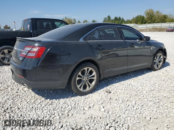 2013 Ford Taurus SEL with VIN 1FAHP2H8XDG229163, listed as a Copart auction lot 71637534 with 120,525 mi miles and Clean Title. Bid and sale history available at DreamBid. Image 3.
