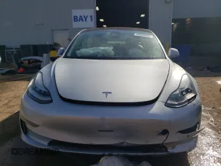 2018 Tesla Model 3 Long Range Battery with VIN 5YJ3E1EB1JF069197, listed as a Copart auction lot 48069465 with Not Provided miles and Salvage Title. Bid and sale history available at DreamBid. Image 5.