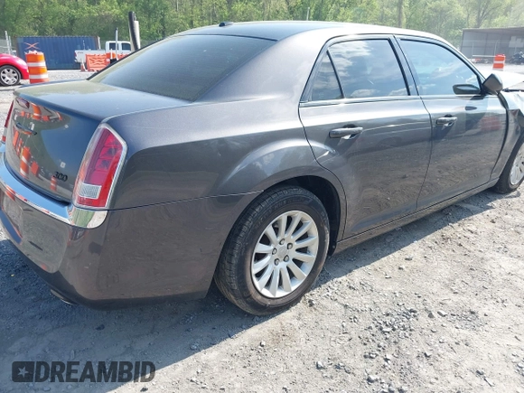 2014 Chrysler 300 z VIN 2C3CCAAG1EH212760, wystawiony jako IAAI lot #42139245 z przebiegiem 129 868 mil mil oraz . Historia ofert i sprzedaży dostępna na DreamBid. Obrazek 4.