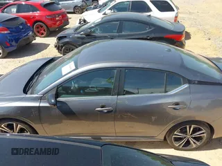2021 Nissan Sentra SR z VIN 3N1AB8DV9MY210842, wystawiony jako IAAI lot #42044940 z przebiegiem 38 076 mil mil oraz . Historia ofert i sprzedaży dostępna na DreamBid. Obrazek 14.