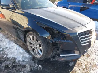 2017 Cadillac CTS Luxury AWD z VIN 1G6AX5SX7H0176310, wystawiony jako IAAI lot #41293373 z przebiegiem 161 264 mil mil oraz . Historia ofert i sprzedaży dostępna na DreamBid. Obrazek 6.