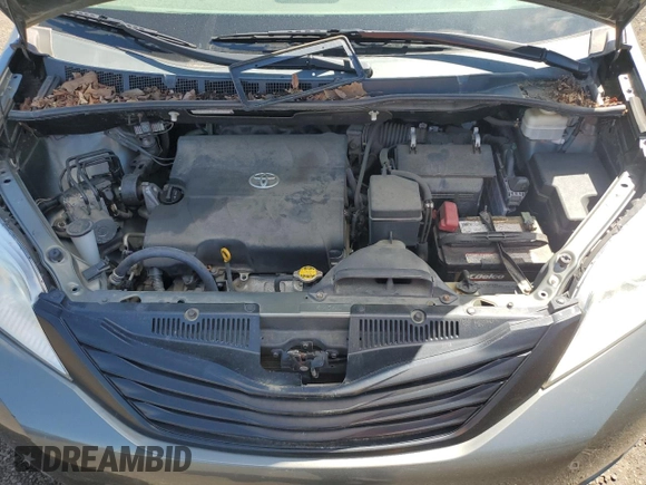 2012 Toyota Sienna with VIN 5TDZK3DC8CS198495, listed as a Copart auction lot 57335205 with 66,786 mi miles and Salvage title. Bid and sale history available at DreamBid. Image 12.