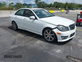 2014 Mercedes-Benz C C 250 Sport with VIN WDDGF4HB0EG255701, listed as a IAAI auction lot 42213602 with 107,102 mi miles. Bid and sale history available at carsss.com. Image 1.