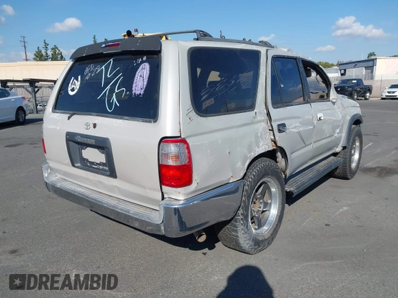 1998 Toyota 4Runner SR5 z VIN JT3GN86RXW0058568, wystawiony jako IAAI lot #38222829 z przebiegiem 217 390 mil mil oraz . Historia ofert i sprzedaży dostępna na DreamBid. Obrazek 4.