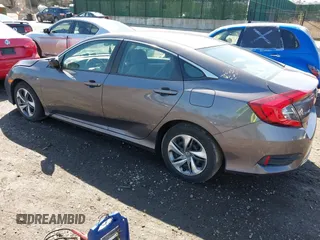2019 Honda Civic LX with VIN 2HGFC2F66KH547041, listed as a IAAI auction lot 41984140 with 90,123 mi miles and . Bid and sale history available at DreamBid. Image 3.