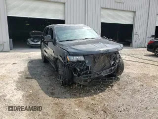 2018 Jeep Grand Cherokee Laredo E with VIN 1C4RJEAG0JC361922, listed as a Copart auction lot 56972245 with 82,237 mi miles and Salvage title. Bid and sale history available at DreamBid. Image 15.