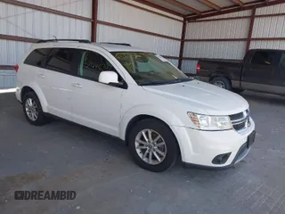 2013 Dodge Journey SXT with VIN 3C4PDDBG4DT692308, listed as a IAAI auction lot 42044391 with 221,187 mi miles and . Bid and sale history available at DreamBid. Image 1.