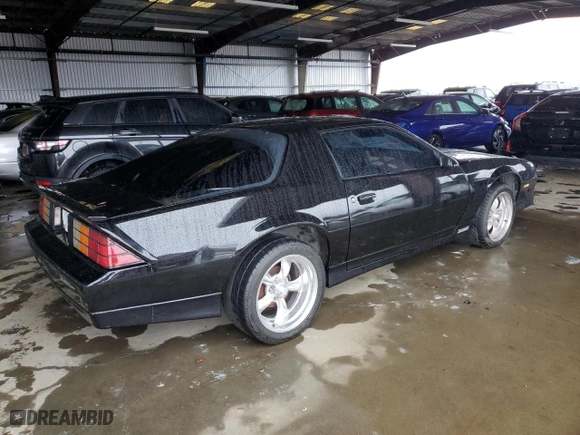 1986 Chevrolet Camaro Z28 Sport with VIN 1G1FP87H8GL106911, listed as a Copart auction lot 81903004 with 24,202 mi miles and Salvage Title. Bid and sale history available at carsss.com. Image 3.