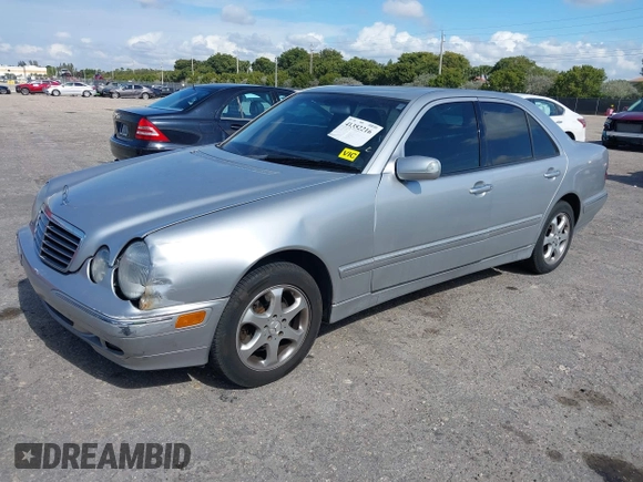 2002 Mercedes-Benz E-Class with VIN WDBJF82J02X070968, listed as a IAAI auction lot 41352216 with 91,704 mi miles. Bid and sale history available at carsss.com. Image 2.