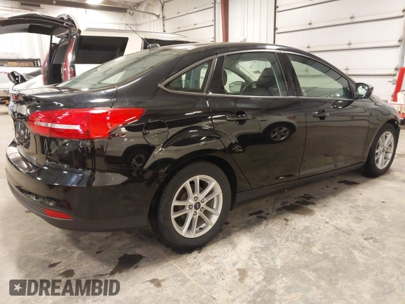 2018 Ford Focus SE with VIN 1FADP3F23JL215479, listed as a IAAI auction lot 41936036 with 96,560 mi miles. Bid and sale history available at carsss.com. Image 4.