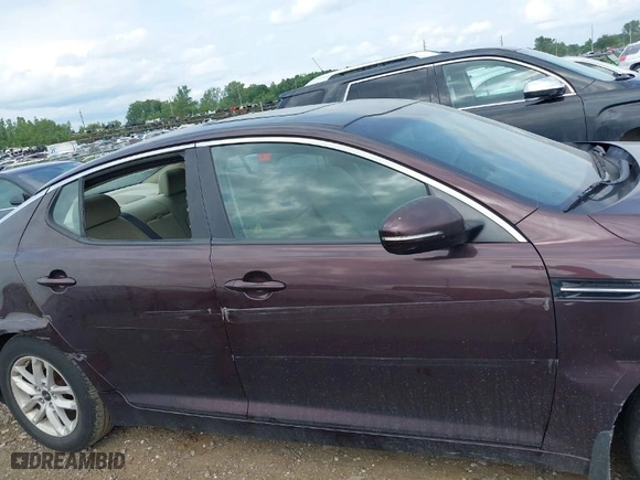 2011 Kia Optima LX with VIN KNAGM4A73B5063778, listed as a IAAI auction lot 39932051 with 143,175 mi miles. Bid and sale history available at carsss.com. Image 15.