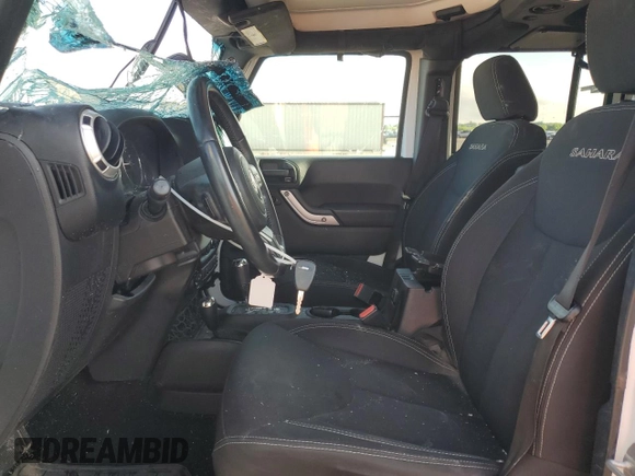 2016 Jeep Wrangler Unlimited Sahara with VIN 1C4BJWEG6GL301301, listed as a Copart auction lot 54362595 with 110,295 mi miles and Salvage title. Bid and sale history available at DreamBid. Image 7.