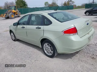 2010 Ford Focus SE with VIN 1FAHP3FN3AW217100, listed as a IAAI auction lot 42061308 with 284,276 mi miles. Bid and sale history available at carsss.com. Image 3.